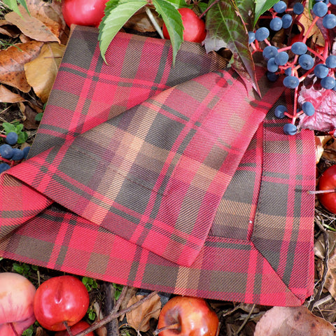 Maple Leaf tartan napkin with berries and apples on a natural background